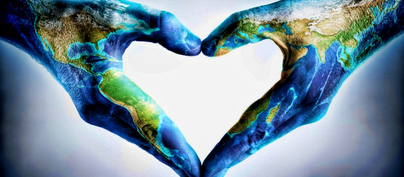 45044923 – earth’s day celebration – hands shaped heart with world map